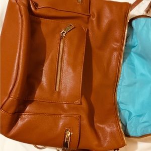 NWT Beautiful large leather backpack with changing leather pad